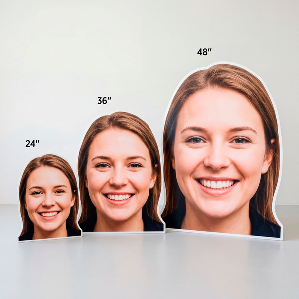 Cardboard cutouts of a woman's face with different height labels on a plain background